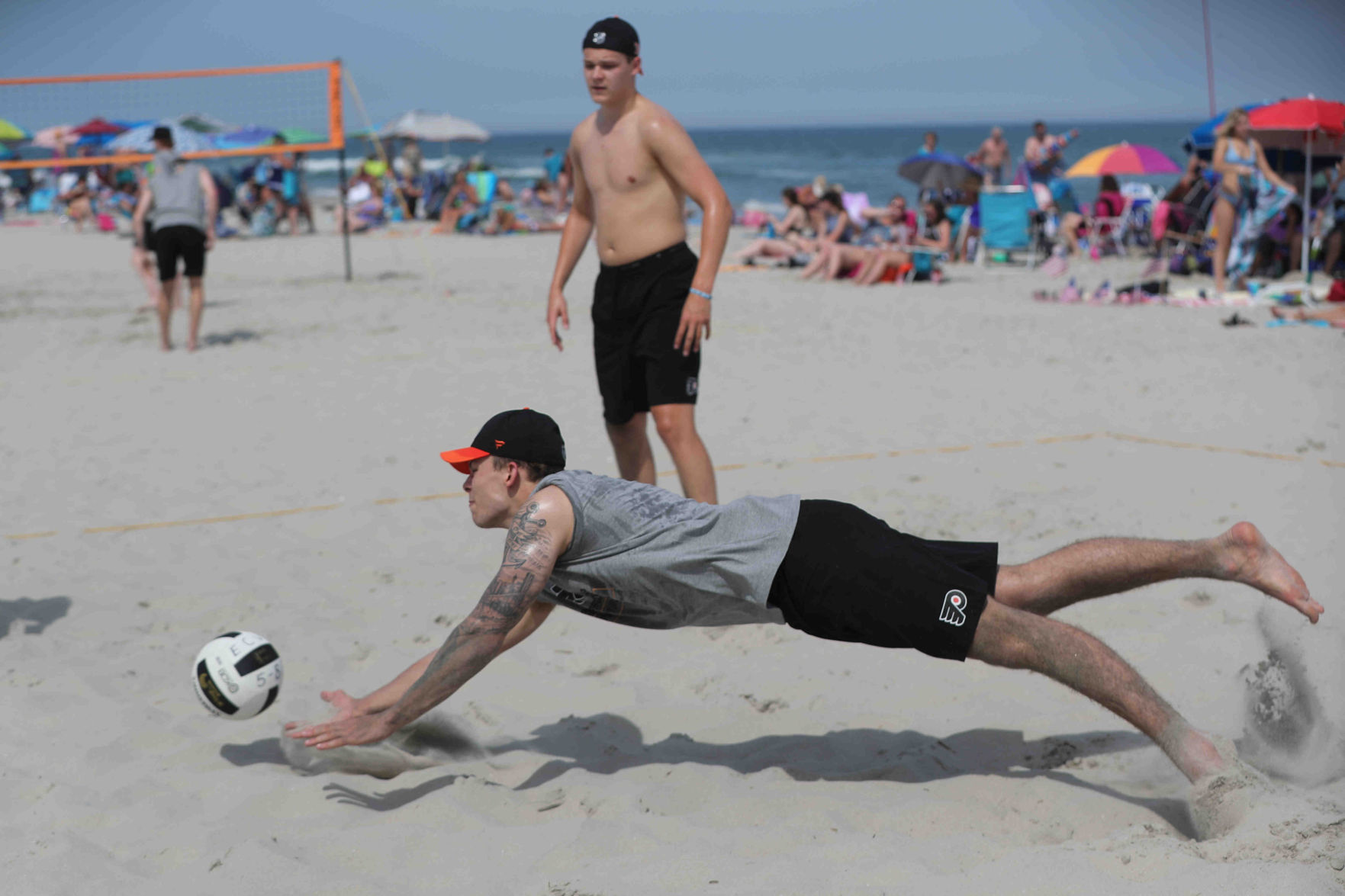 Philadelphia Flyers prospects sign autographs and play volleyball